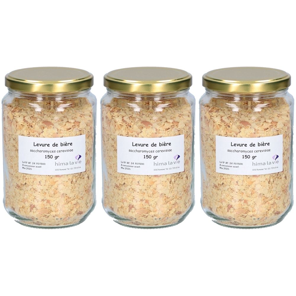 Trois bocaux en verre avec couvercles dorés. Étiquettes "Levure de bière" et "150 gr". Marque : hima lavie. Contenu : flocons brun clair.