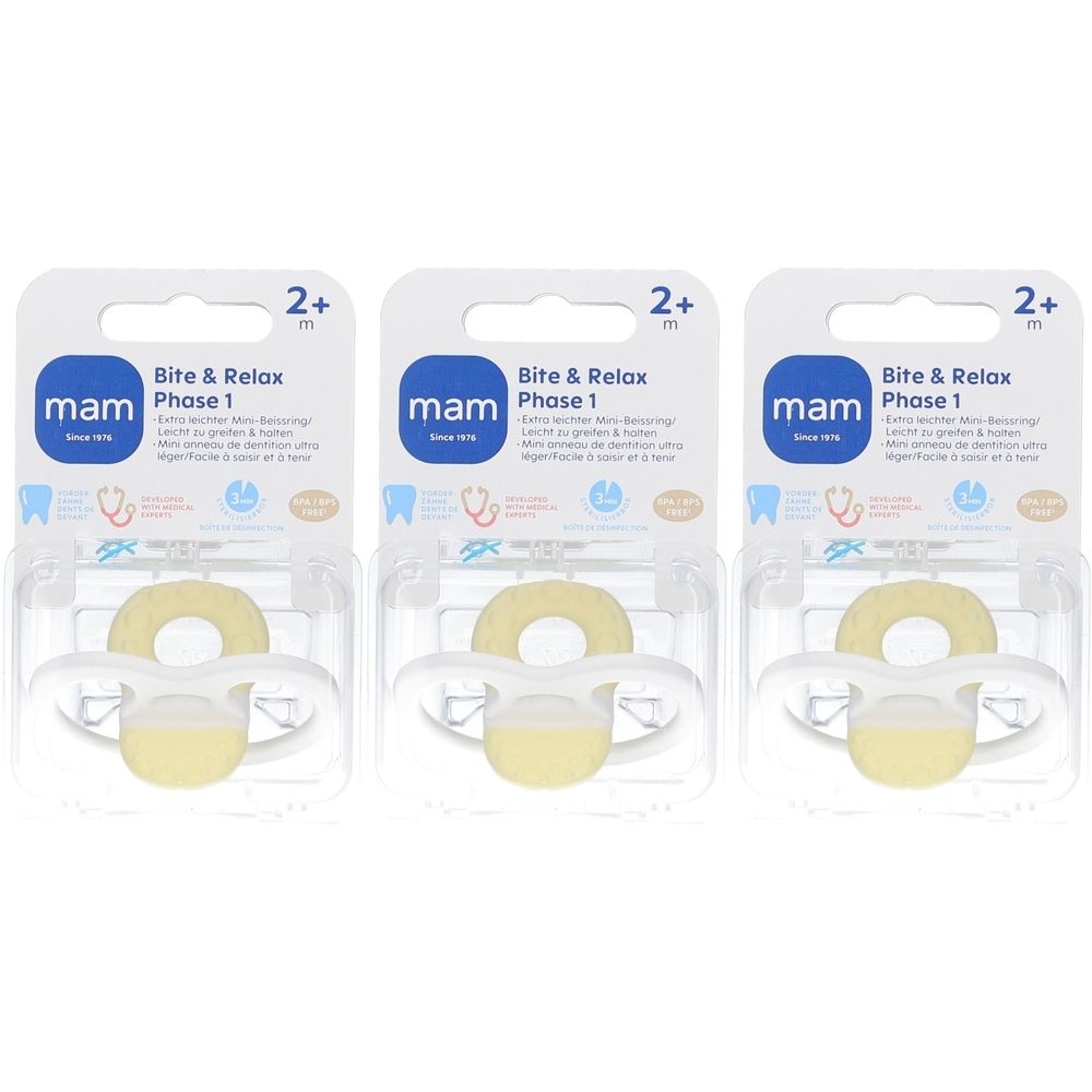Drei MAM Beißringe in Blisterverpackung. Gelber Ring und Sauger, weißer Halter. Auf der Verpackung steht "Bite & Relax Phase 1".