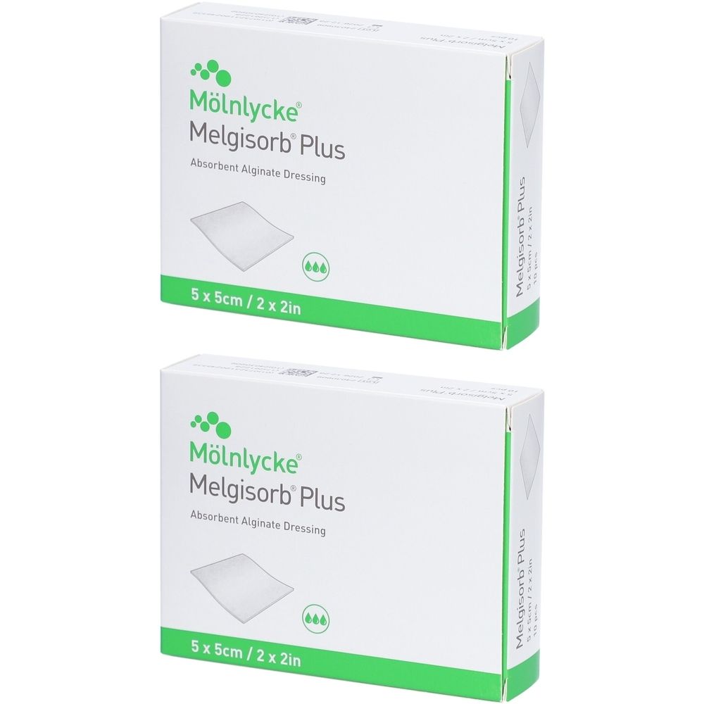 Zwei weiße Kartons mit grünen Akzenten. Aufdruck: Mölnlycke Melgisorb Plus, 5x5cm/2x2in. Alginat-Verband.