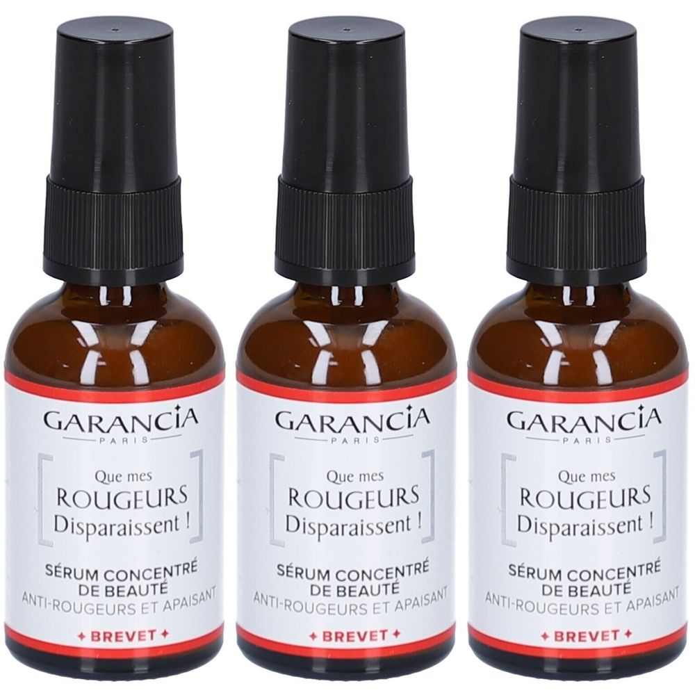Trois flacons de sérum. Flacons en verre brun avec vaporisateur noir. Inscription: GARANCIA, Que mes Rougeurs Disparaissent!, Sérum concentré de beauté.