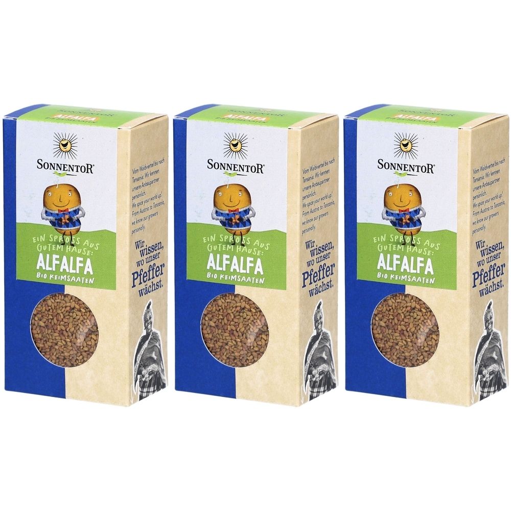 Drei rechteckige Kartons mit Alfalfa-Samen. Aufschrift: Sonnentor, Alfalfa, Bio. Sichtbares Logo: Sonne mit Gesicht.