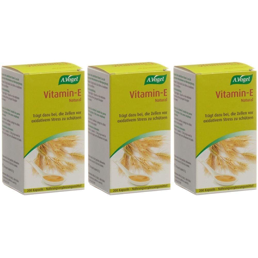 Trois boîtes de A. Vogel Vitamine-E. Emballage jaune avec des accents verts et des informations sur le produit. Illustration d'épis de blé.