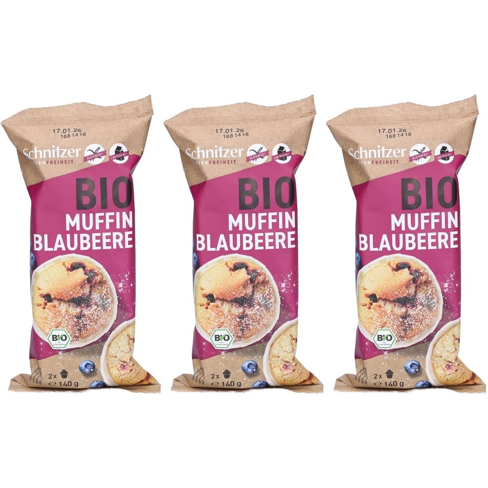 Trois emballages de Schnitzer Bio Muffin Blaubeere. Emballage avec fond violet et image du produit. Label bio et indication du poids.