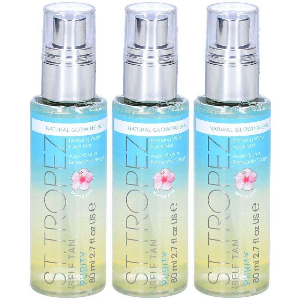 Trois flacons de brume visage autobronzante St. Tropez®. Flacons transparents avec vaporisateurs argentés. Inscription : Aqua-Brume Bronzante Visage.