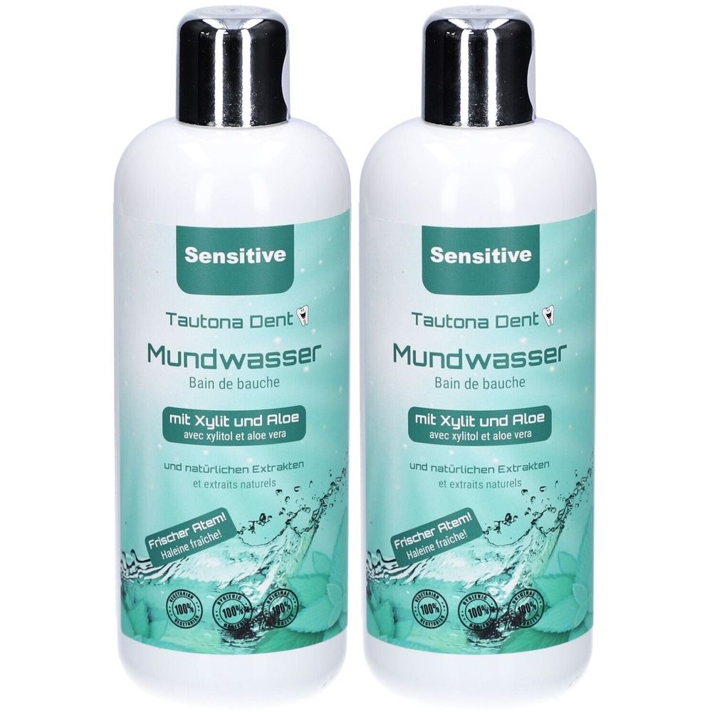 Zwei Flaschen Mundspülung. Aufschrift: Sensitive, Tautona Dent Mundwasser mit Xylit und Aloe. Flaschen mit silbernen Deckeln.