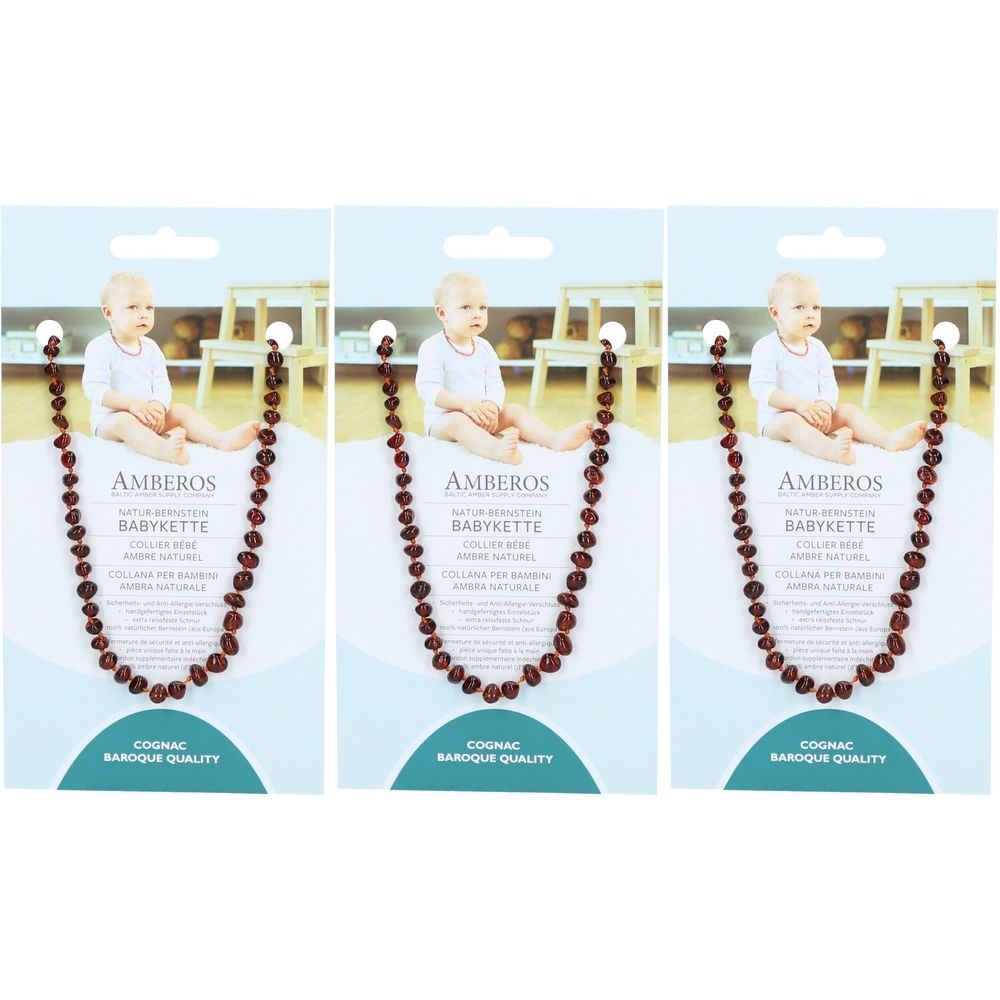 Trois colliers pour bébés sur emballage. Chaque collier a des perles en ambre baroque couleur cognac. AMBEROS et BABY KETTE sont écrits sur chaque emballage.