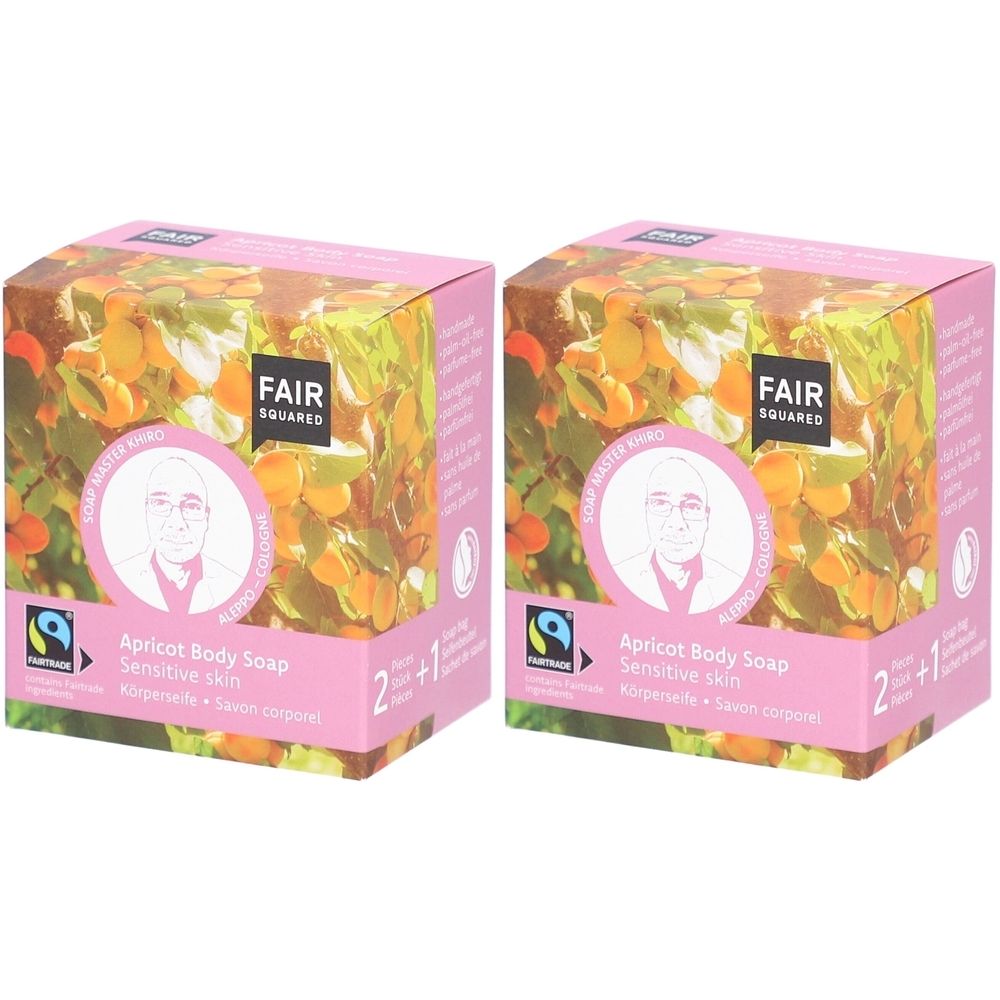 Zwei rosa Kartons mit FAIR SQUARED-Logo und Aufschrift "Apricot Body Soap Sensitive skin". Fairtrade-Siegel.