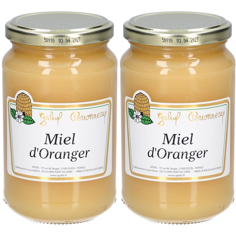 Zwei Gläser Honig. Auf Etikett: Miel d'Oranger, Logo mit Bienenwabe und Blüte. Deckel mit Aufdruck. Glasform zylindrisch.