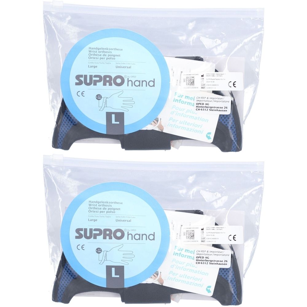Deux attelles de main SUPROhand emballées. Détails bleus et noirs. Taille L. Marquage CE.