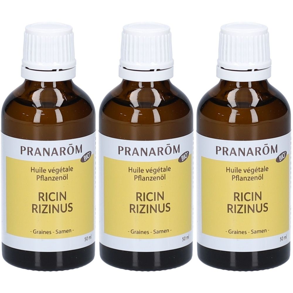 Drei braune Glasflaschen mit weißem Verschluss. Auf gelben Etiketten steht "RICIN RIZINUS" und "PRANAROM".