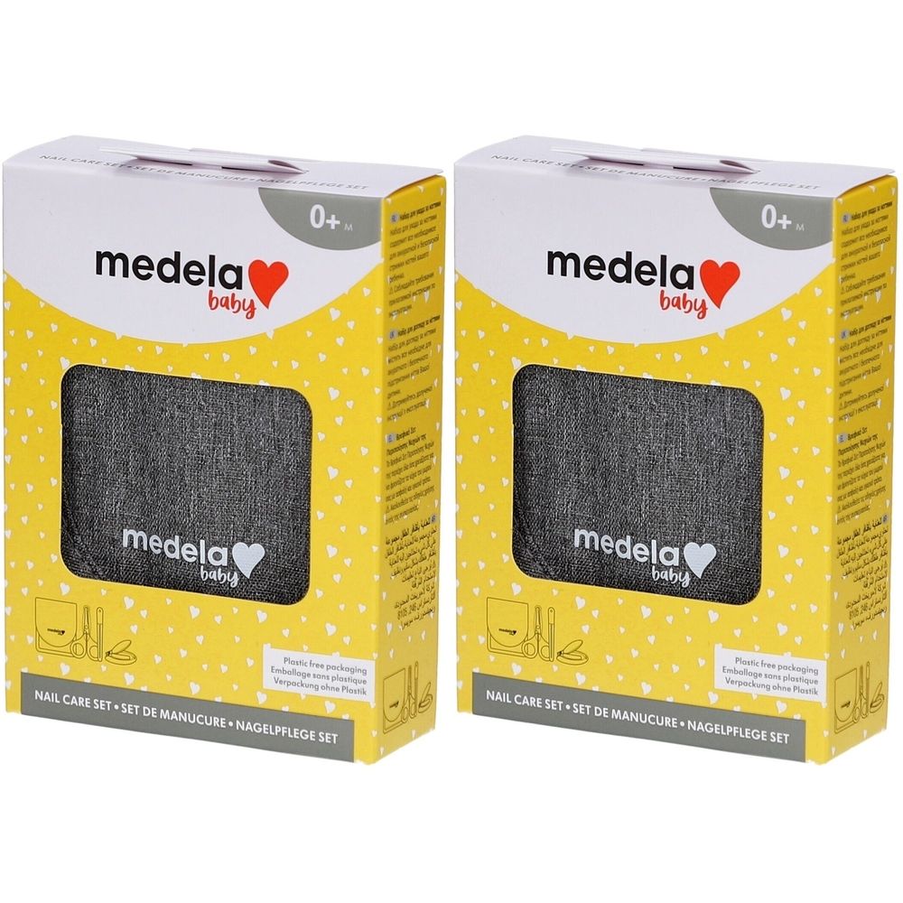Deux boîtes jaunes avec le logo "medela baby". Inscription "NAIL CARE SET". Fenêtre avec tissu gris. Recommandation d'âge 0+.