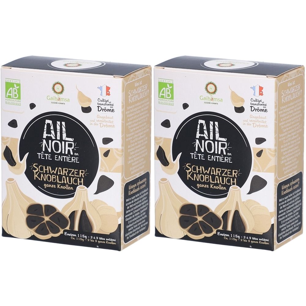 Zwei Kartons mit schwarzem Knoblauch. Aufdrucke: Ail Noir, Schwarzer Knoblauch, AB-Bio-Siegel, Herkunftsbezeichnung.