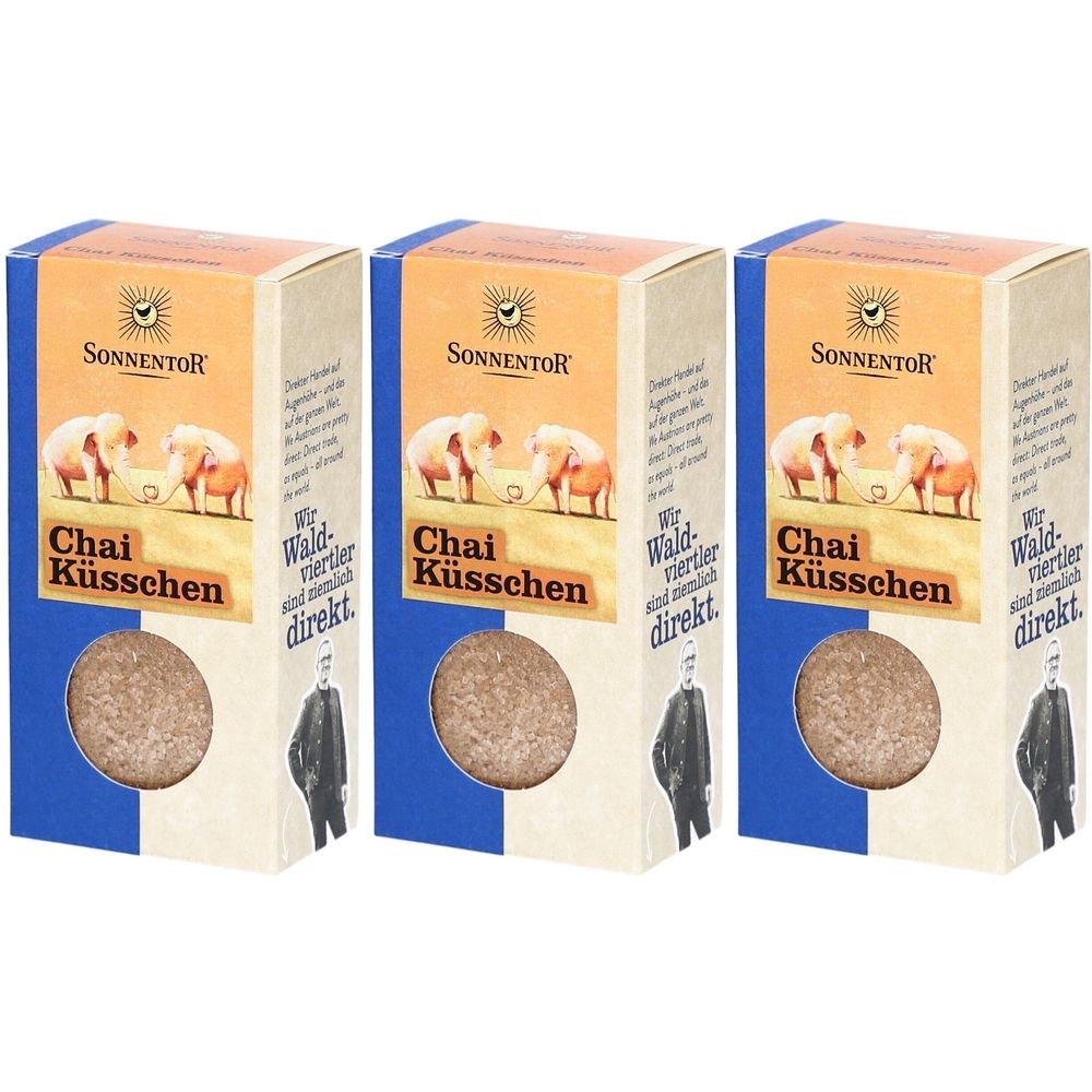 Trois boîtes rectangulaires. Inscription: SONNENTOR, Chai Küsschen. Forme ronde et brune visible. Tons bleus et beiges.