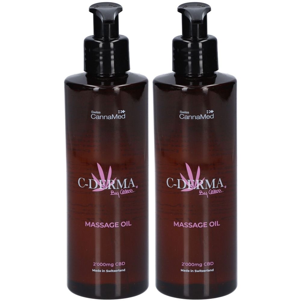Deux flacons bruns avec pompes noires. Inscription: C-DERMA, Massage Oil, 2000mg CBD. Marque: CannaMed.