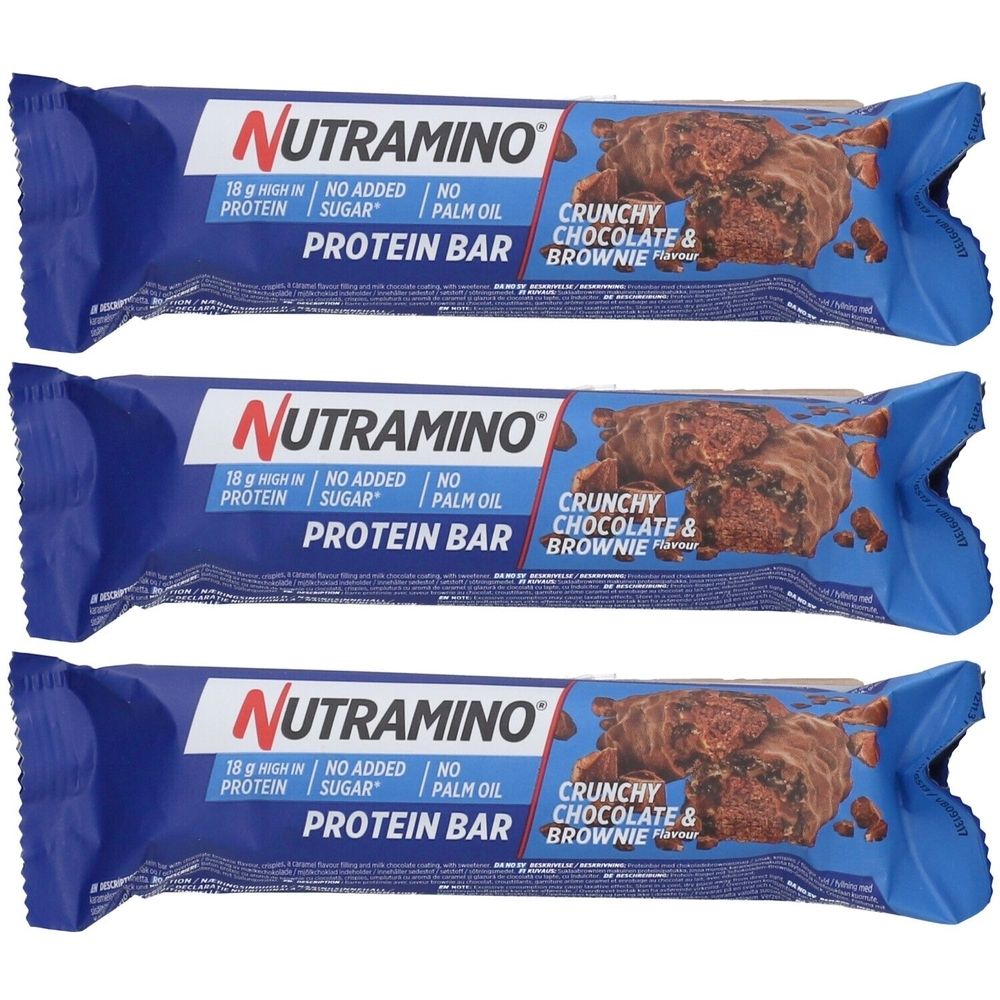 Trois barres protéinées emballées en bleu. Inscription : NUTRAMINO, Protein Bar, Crunchy Chocolate & Brownie. Contient 18g de protéines, sans sucre et sans huile de palme.