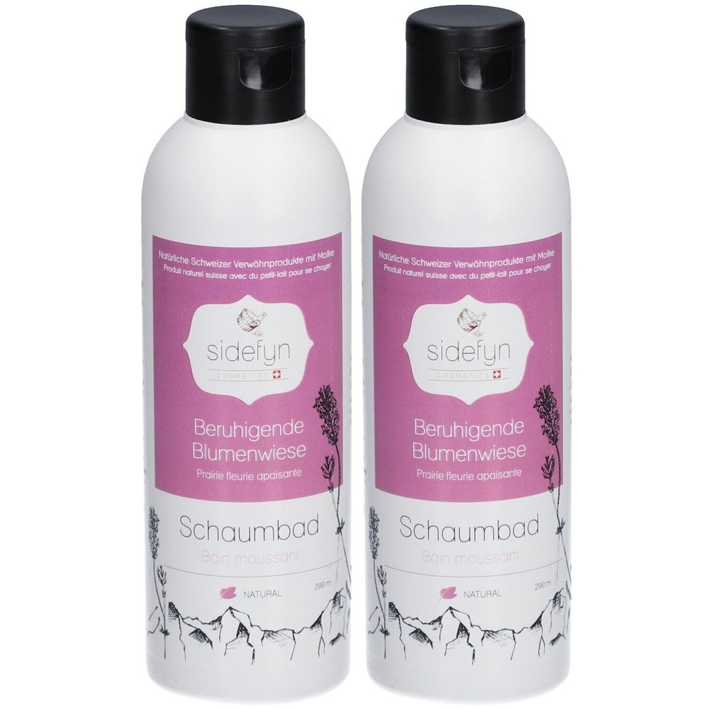 Deux flacons blancs avec bouchons noirs. Chaque flacon porte une étiquette avec des informations sur le produit et le logo sidefyn.