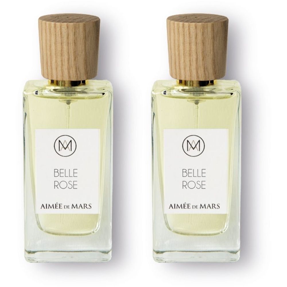 Zwei rechteckige Glasflakons mit Holzdeckeln. Auf Etiketten: Belle Rose, Aimée de Mars. Logo: ein M im Kreis.