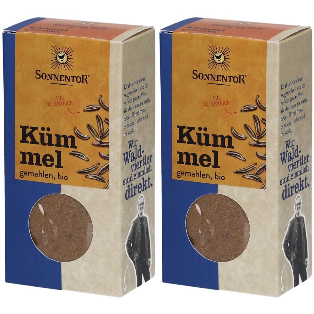 Deux boîtes de SONNENTOR Kümmel gemahlen, BIO. Poudre brune dans une boîte avec logo et texte. Couleurs bleu et beige.