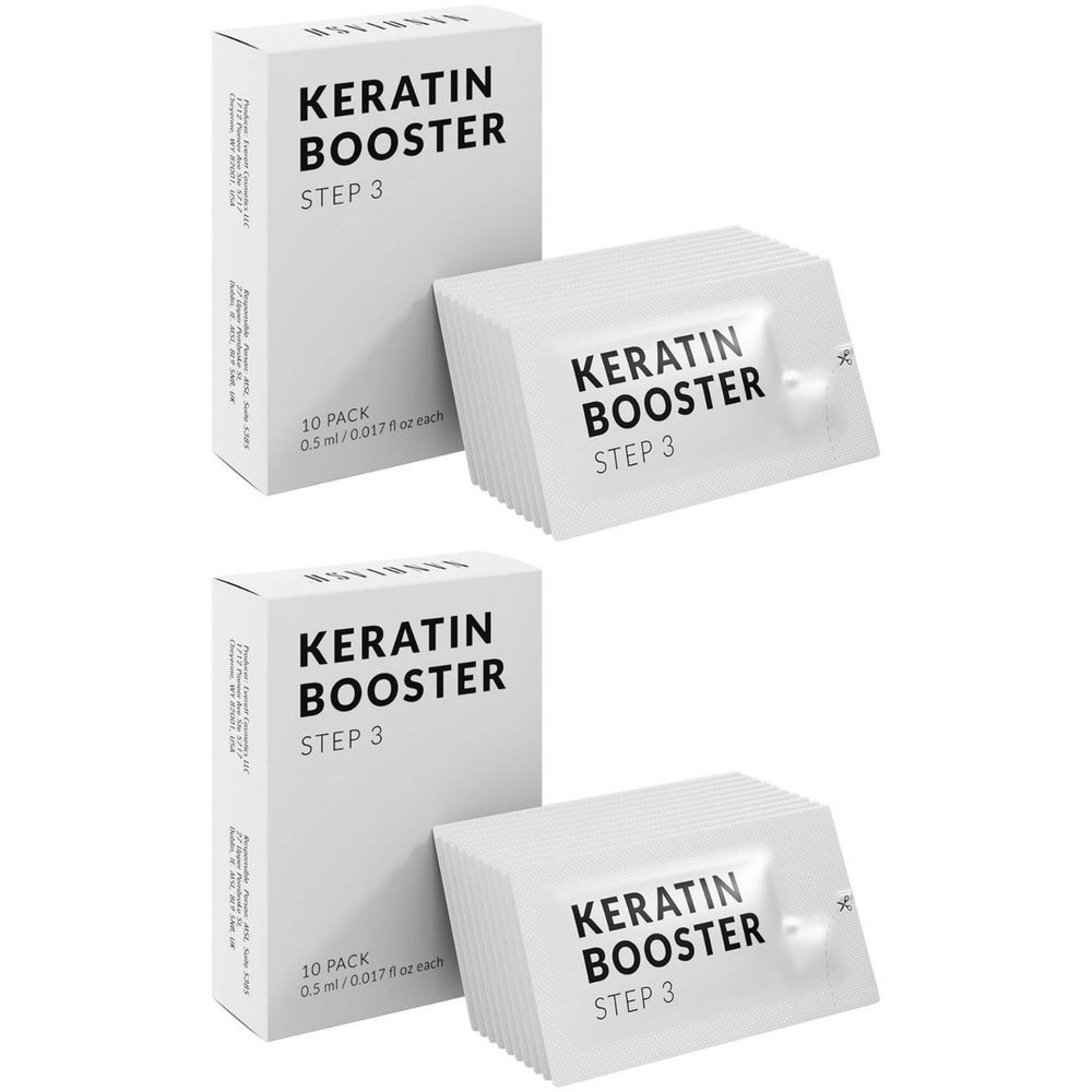 Deux boîtes blanches et deux sachets avec l'inscription "KERATIN BOOSTER STEP 3". Les boîtes indiquent "10 PACK".