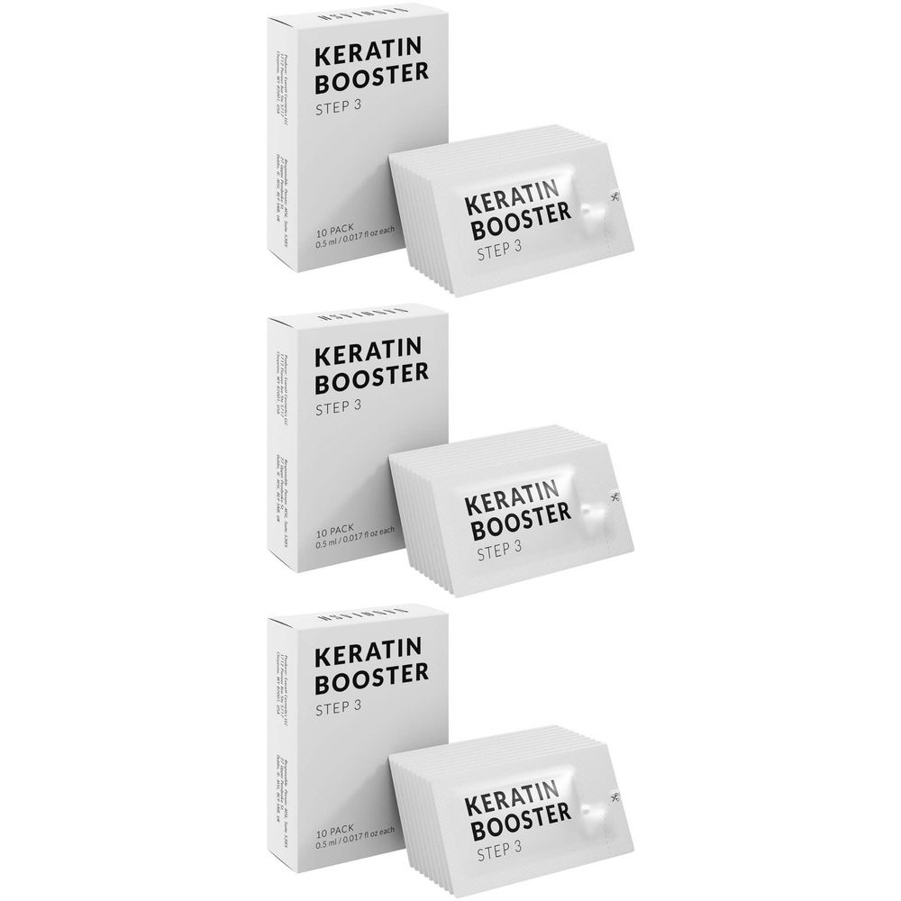 Plusieurs emballages de produits blancs. Sur les boîtes, il est écrit « KERATIN BOOSTER STEP 3 ». Sachets individuels de produit. 10 pièces.