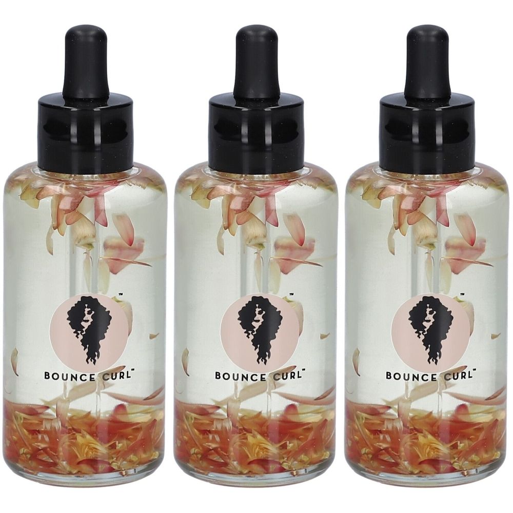Trois flacons transparents avec bouchon noir et pipette. Chaque flacon contient des pétales et le logo Bounce Curl.