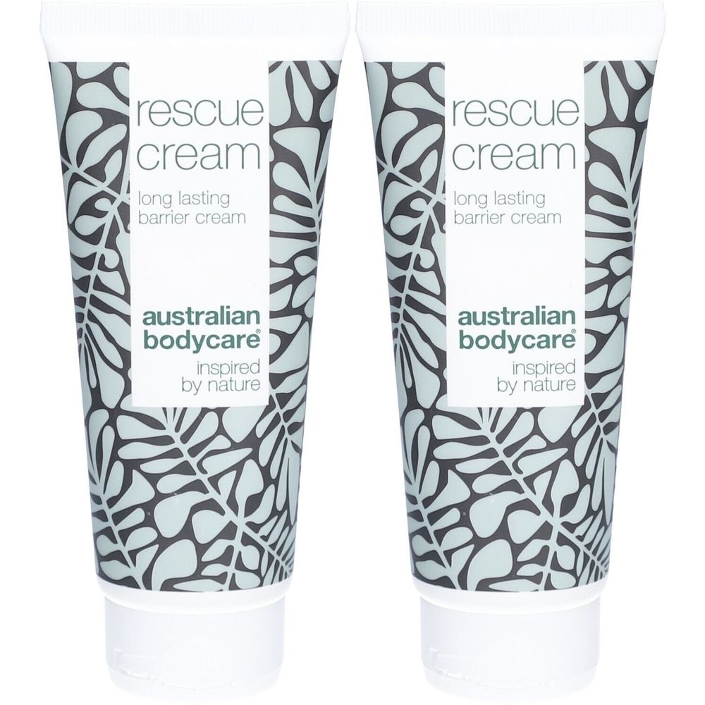 Deux tubes de crème. Inscription: rescue cream, australian bodycare. Blanc, motif feuilles. Bouchon blanc.