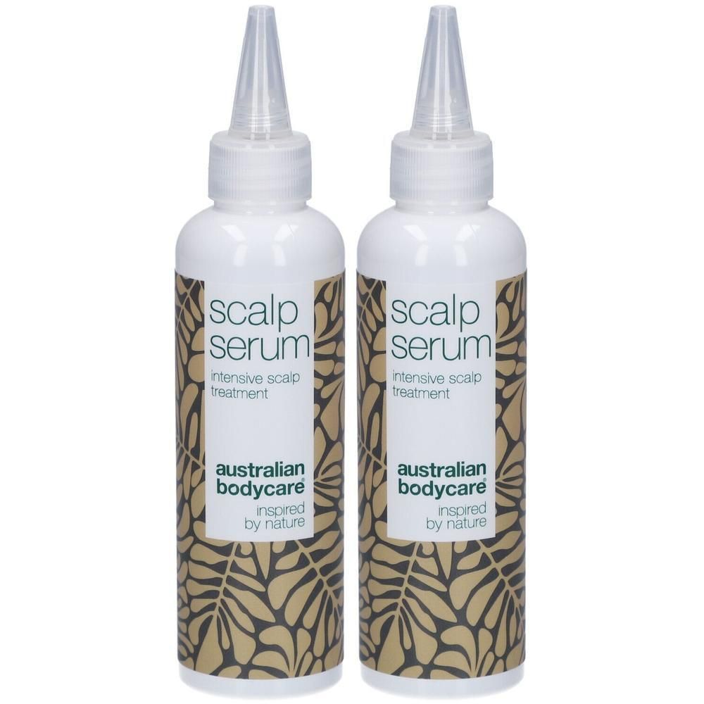 Deux flacons blancs avec applicateur. Inscription: Scalp Serum, traitement intensif du cuir chevelu, Australian Bodycare.