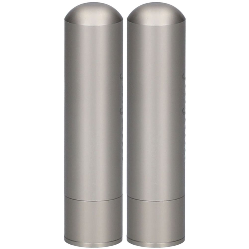 Deux stylos à renifler cylindriques en acier inoxydable beige avec des capuchons arrondis. Les stylos sont côte à côte.