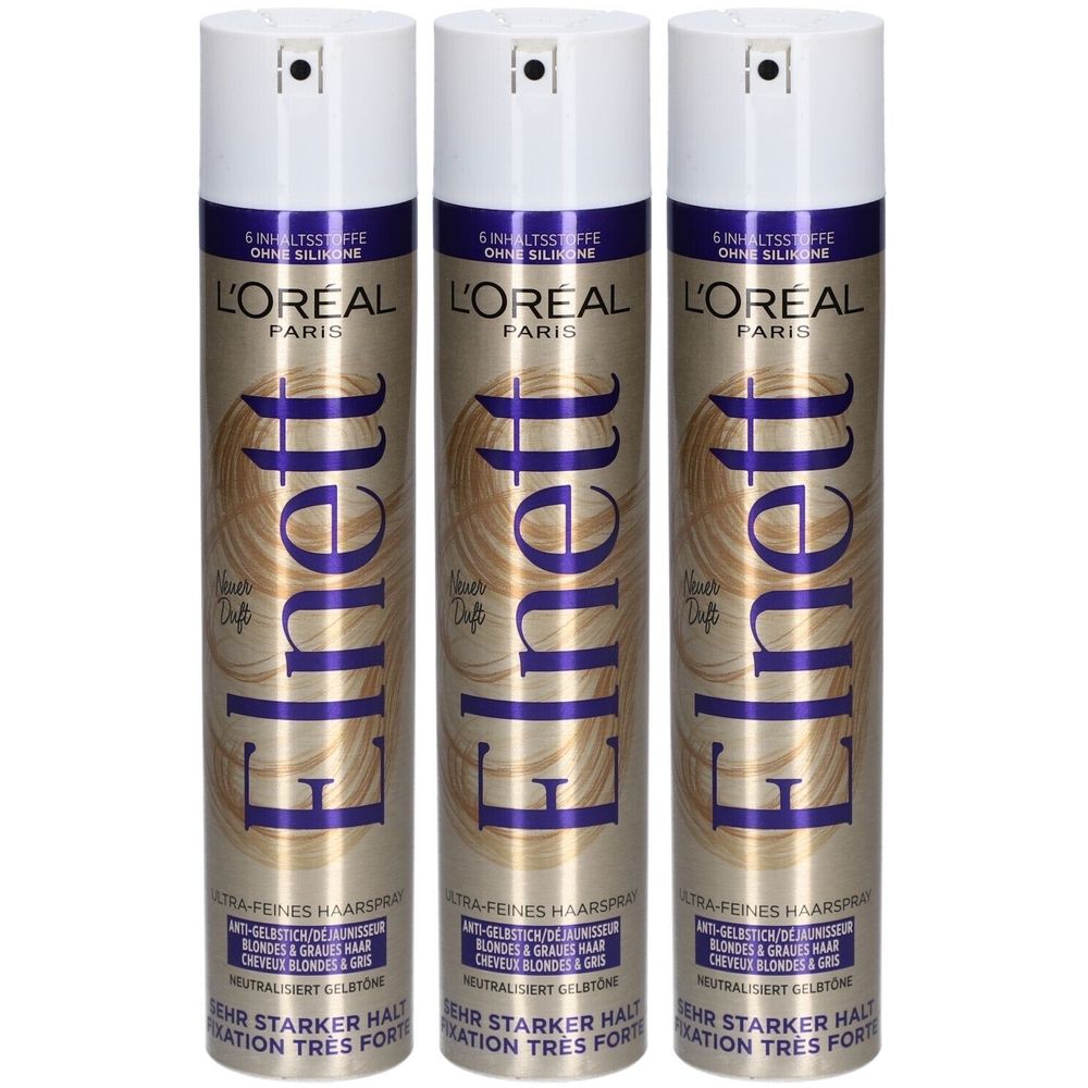 Drei Haarspray-Dosen. Weißer Deckel, goldfarbener Korpus mit lila Schrift. L'Oréal Paris Elnett Ultra Feines Haarspray.