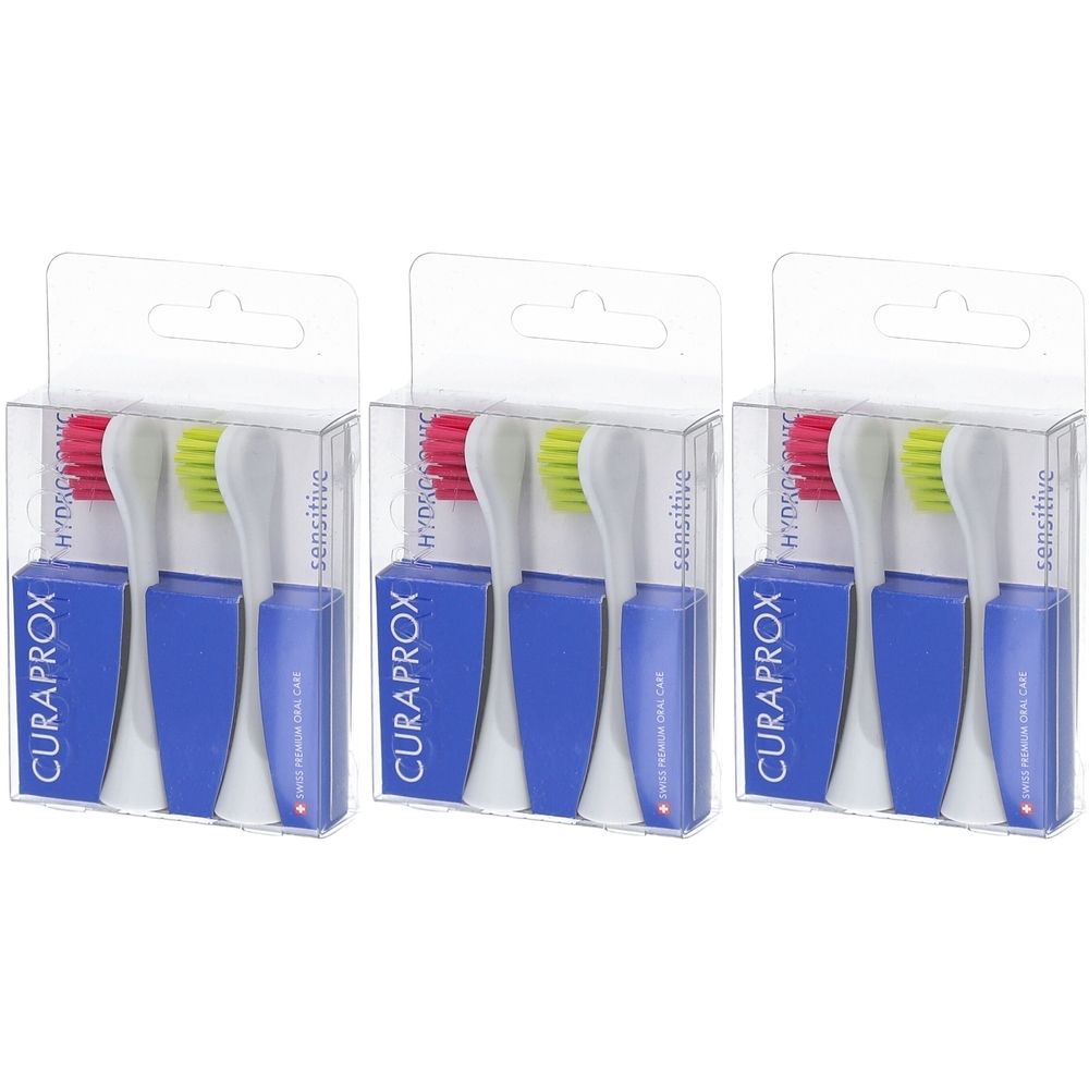 Drei Packungen mit Hydrosonic Sensitive Bürstenköpfen. Jede Packung enthält zwei Bürstenköpfe in transparenten Kunststoffboxen.