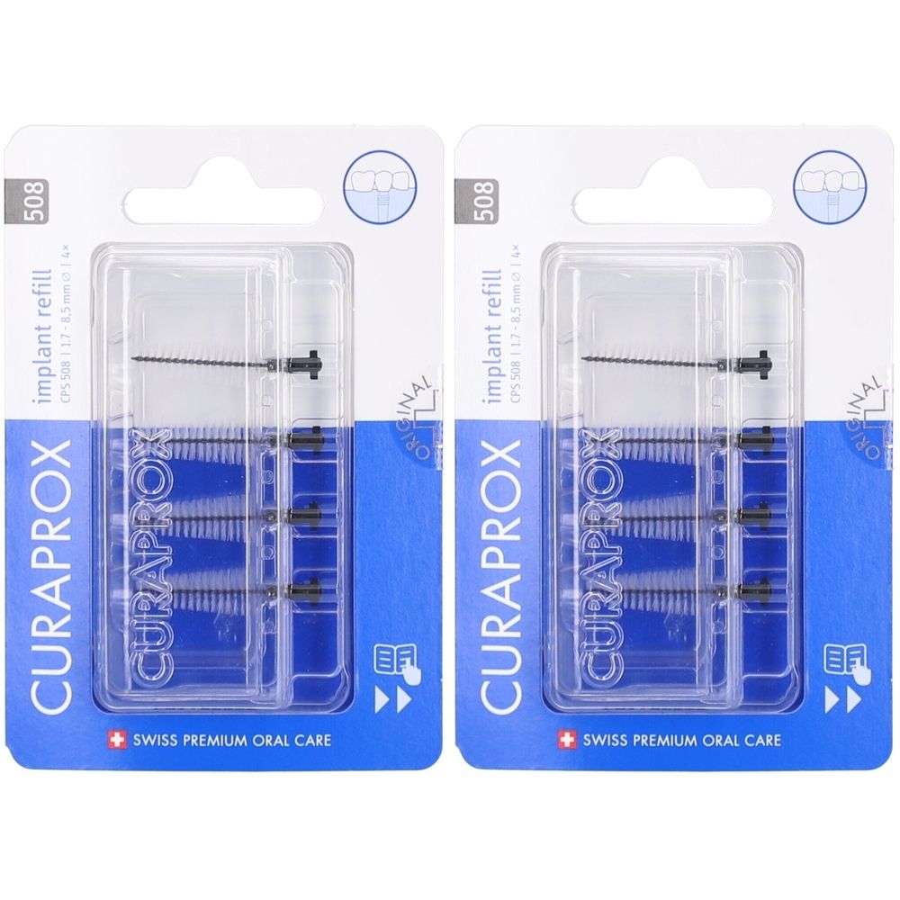 Zwei Packungen Curaprox Bürstenaufsätze CPS 508 Implant. Blaue Verpackung mit transparentem Kunststoff. Schwarze Bürstenköpfe sichtbar.