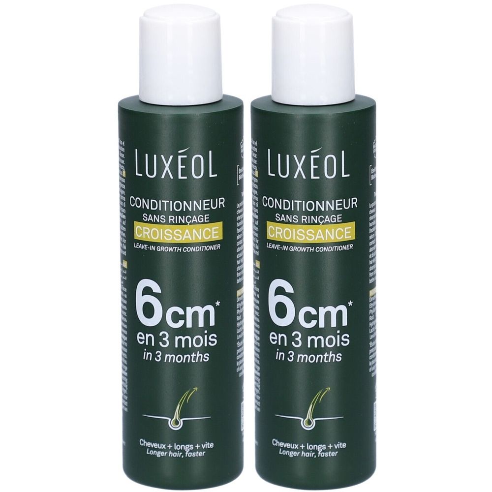 Zwei grüne Flaschen mit weißem Deckel. Aufschrift: LUXÉOL Conditioner, Wachstum, 6 cm in 3 Monaten. Für längeres Haar.