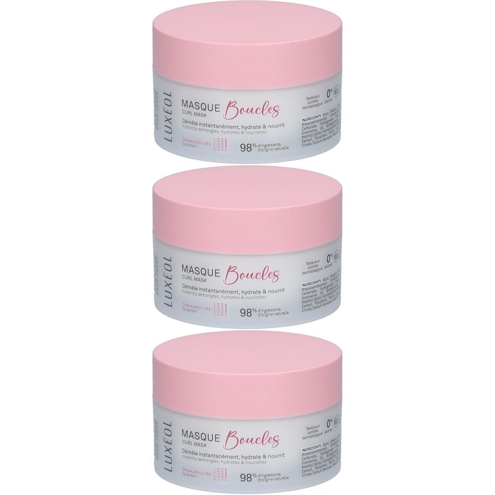 Trois pots avec couvercles roses. Inscription: LUXÉOL, Masque Boucles, 98% ingrédients d'origine naturelle.