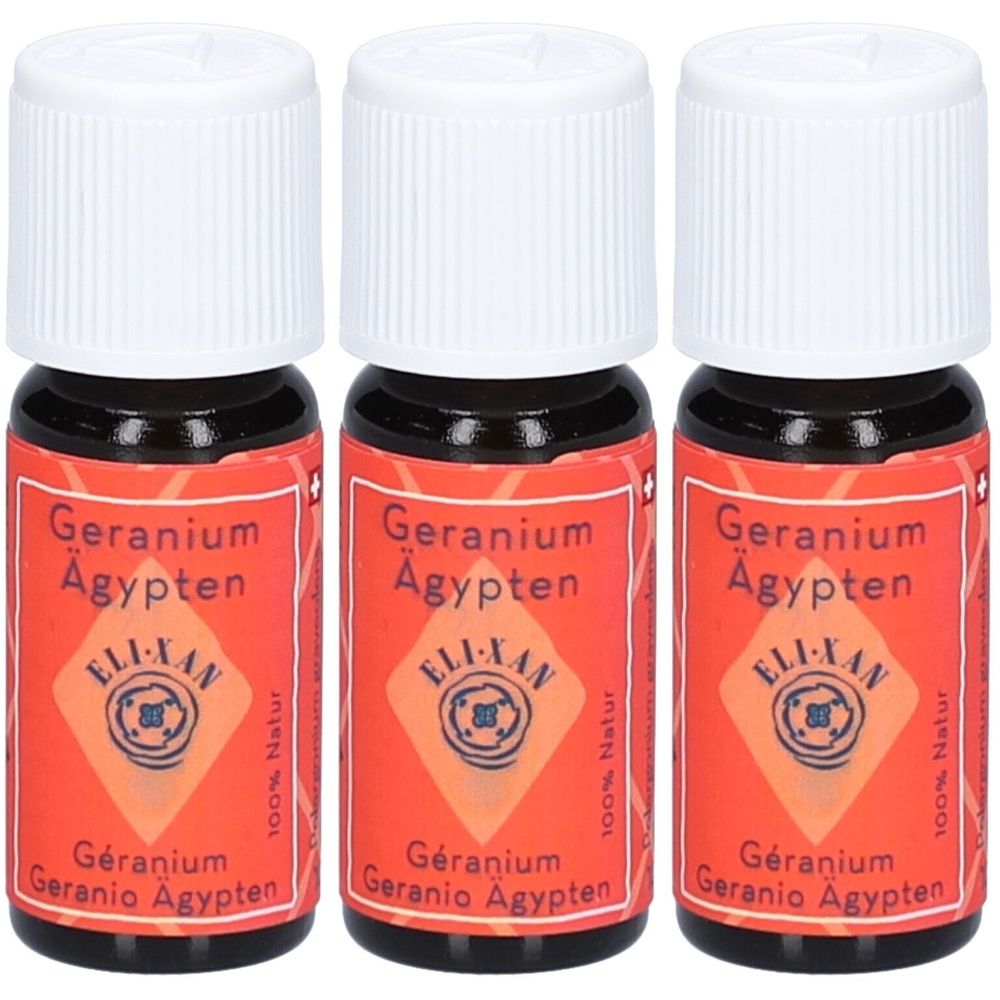 Drei kleine Flaschen mit weißem Deckel und rotem Etikett. Aufschrift: Geranium Ägypten, ELI-XAN, 100% Natur.