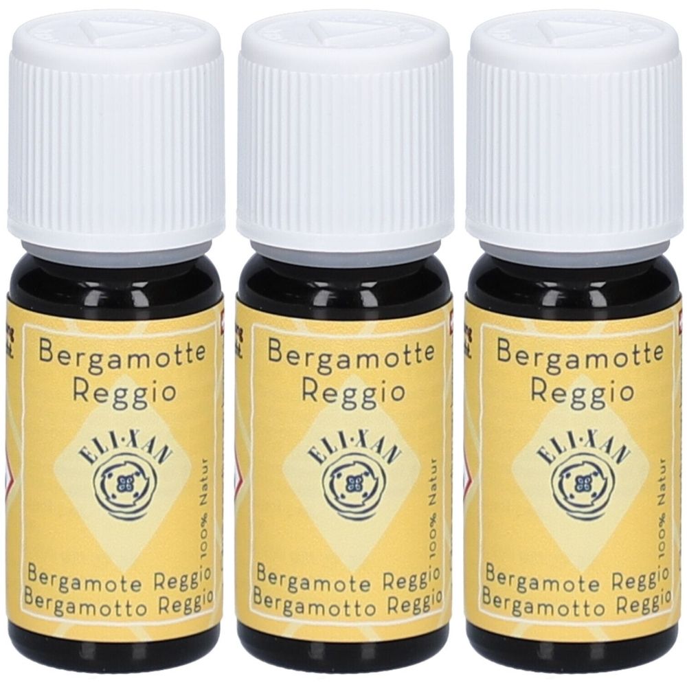 Trois petites bouteilles avec bouchons blancs. L'étiquette jaune indique "Bergamotte Reggio" et "ELI-XAN".
