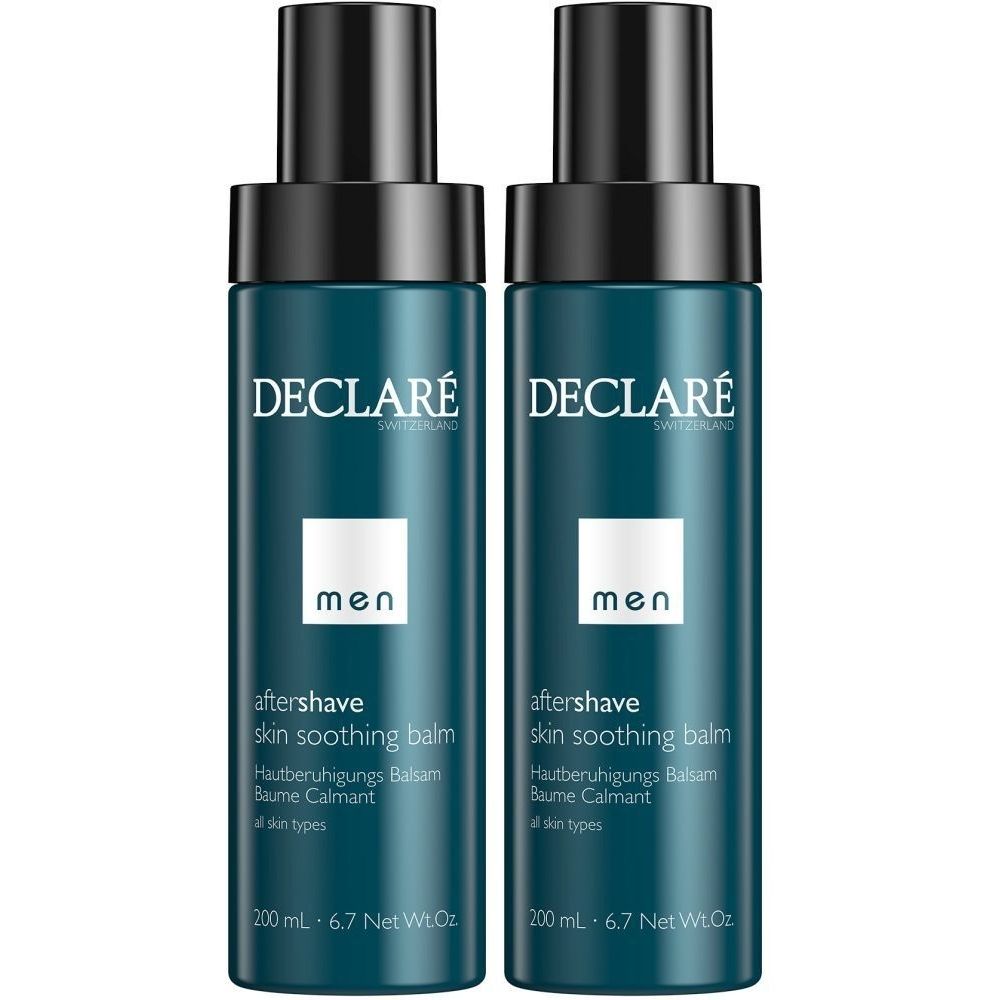 Deux flacons de baume après-rasage DECLARÉ Men. Flacons bleu foncé avec bouchon noir. Texte: Aftershave, Baume apaisant pour la peau, Baume Calmant.