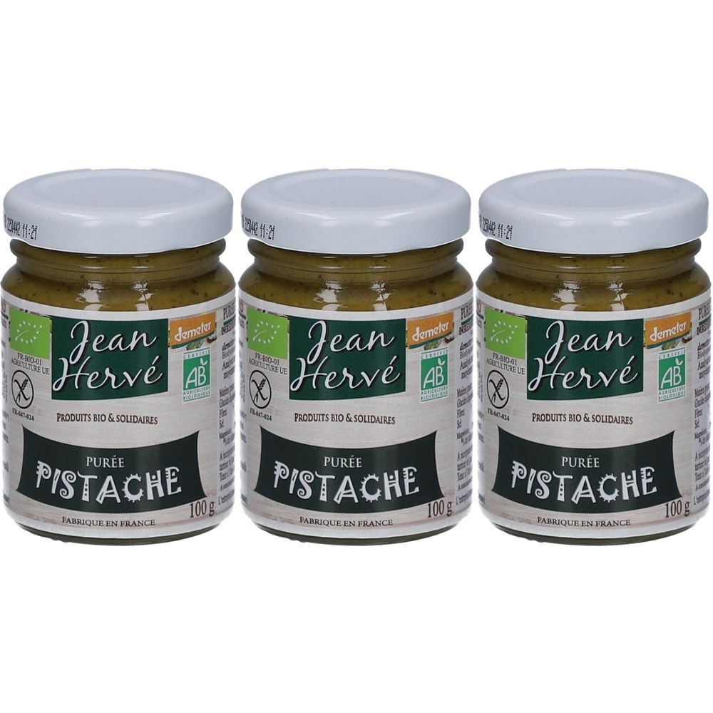 Trois pots de purée de pistaches. Inscription: Jean Hervé, Pistache, sans gluten, label bio. Couvercles blancs, texte vert.