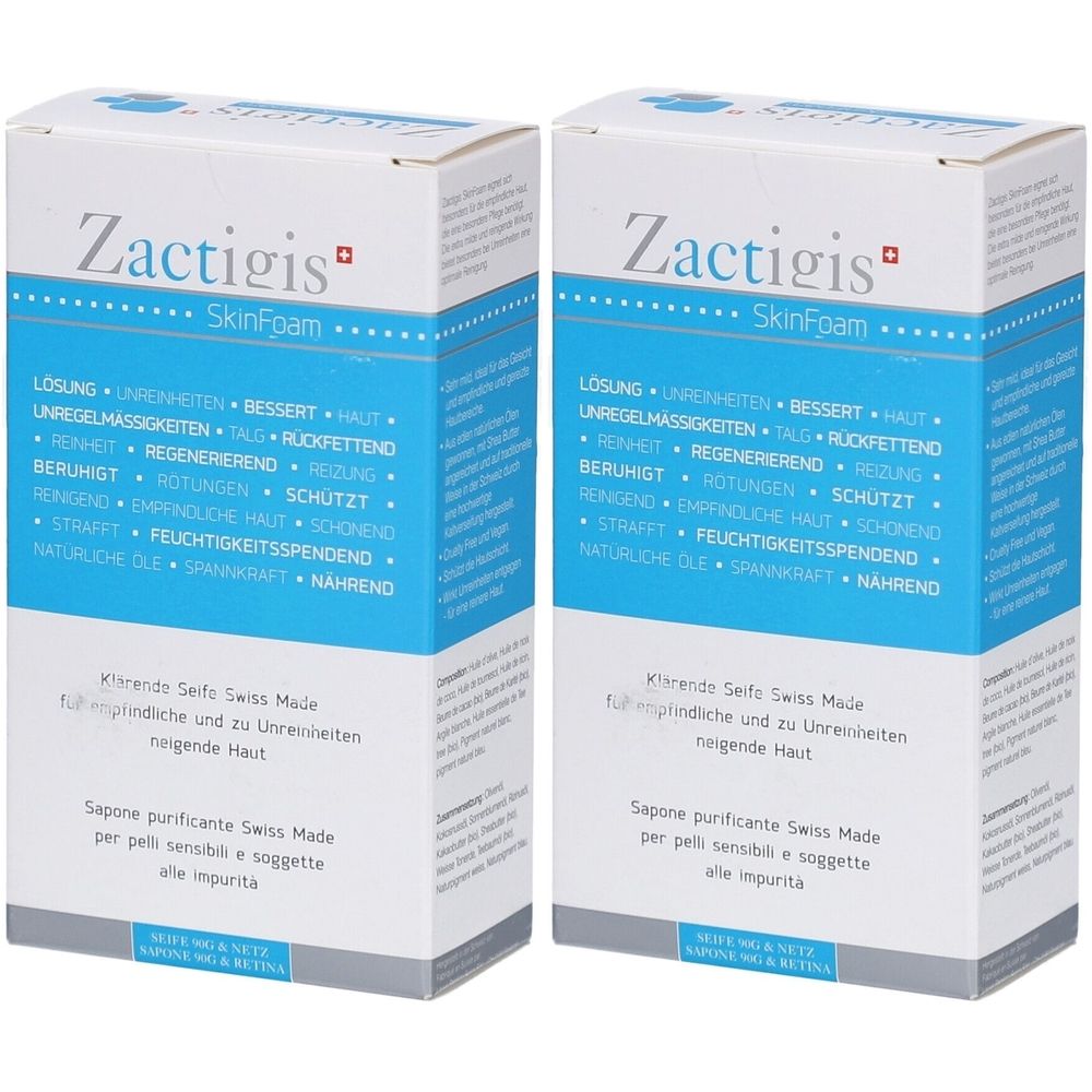 Deux boîtes blanches avec bande bleue. Inscription: Zactigis SkinFoam. Texte en allemand et italien. Produit nettoyant.