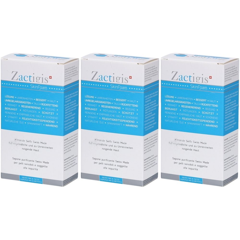 Trois boîtes de Zactigis SkinFoam. Emballage blanc avec bande bleue et texte. Swiss Made.