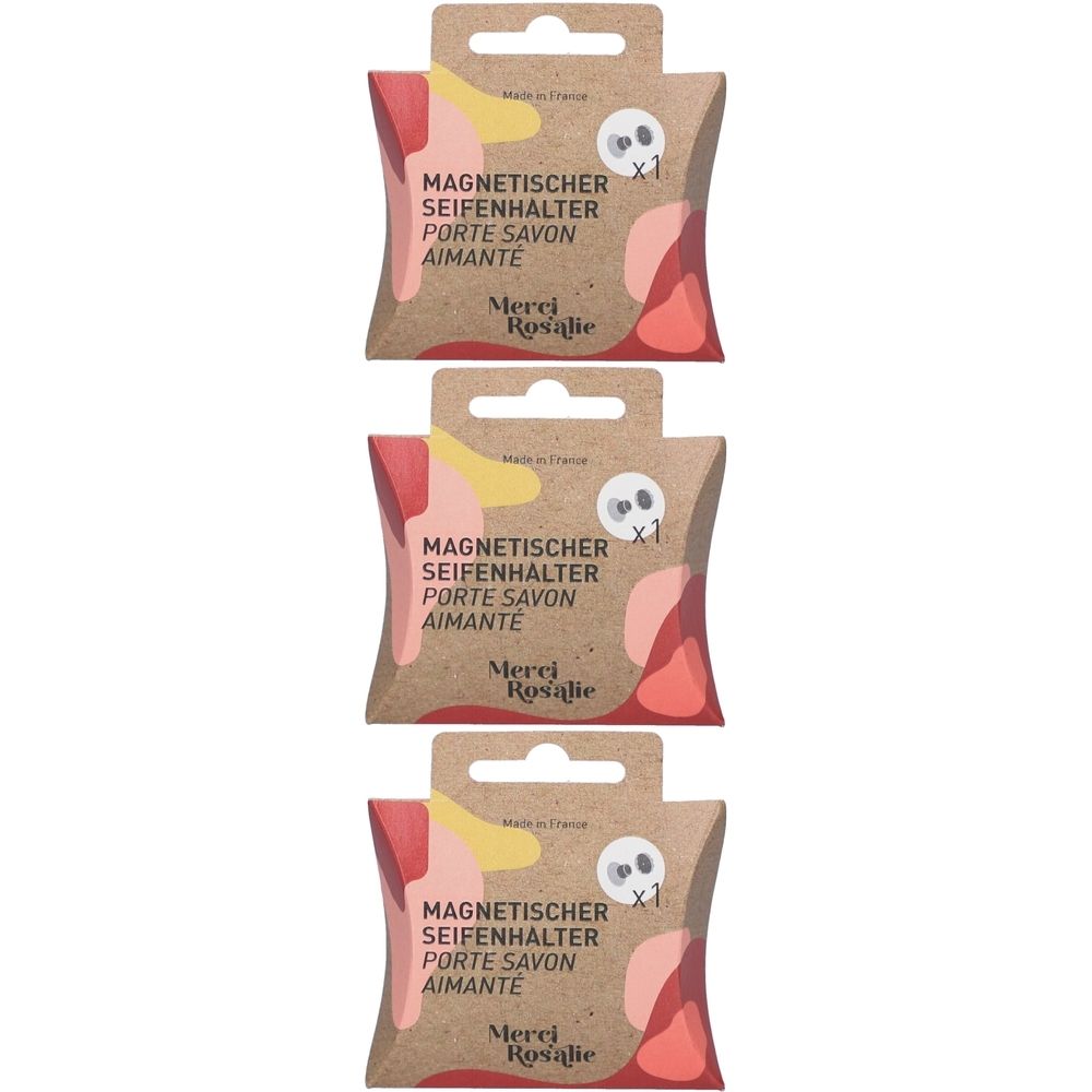 Drei Verpackungen für magnetische Seifenhalter. Aufschrift: MAGNETISCHER SEIFENHALTER, PORTE SAVON AIMANTÉ. Marke: Merci Rosalie.