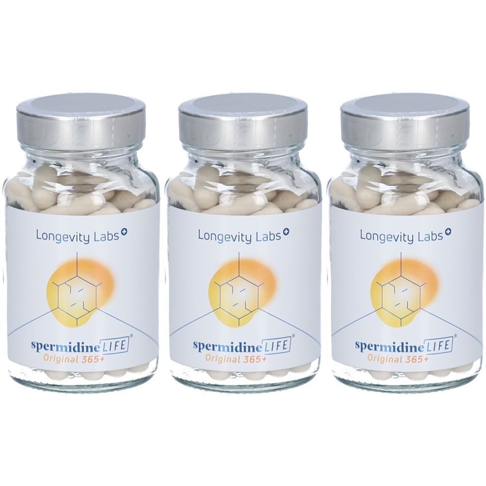 Drei Glasbehälter mit Kapseln. Etiketten mit "Longevity Labs" und "spermidine LIFE Original 365+". Silberne Deckel.