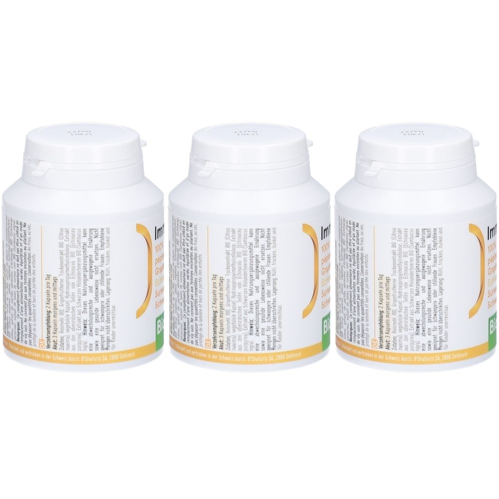 Drei weiße Flaschen mit Klappdeckel. Etiketten mit Text und gelbem Design. Bio-Siegel. 