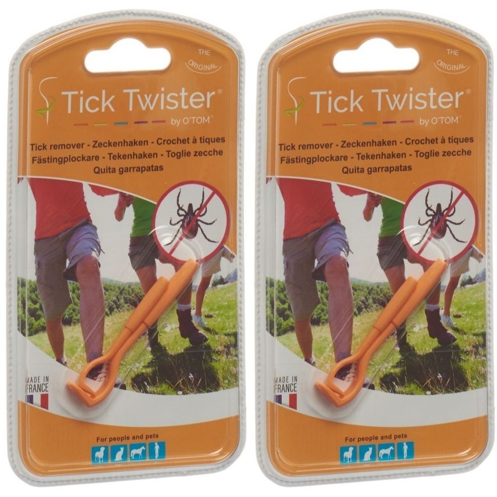 Zwei Blisterpackungen mit orangefarbenen Zeckenhaken. Aufschrift: Tick Twister by O'TOM. Enthält Zeckenentferner.