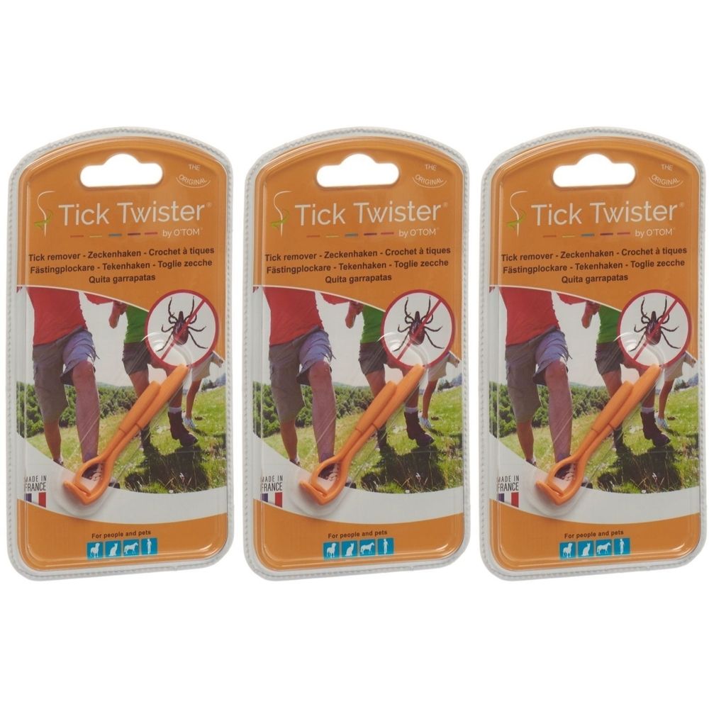 Drei orangefarbene Zeckenhaken in Blisterverpackung. Auf der Verpackung steht "Tick Twister" und "by O'TOM".