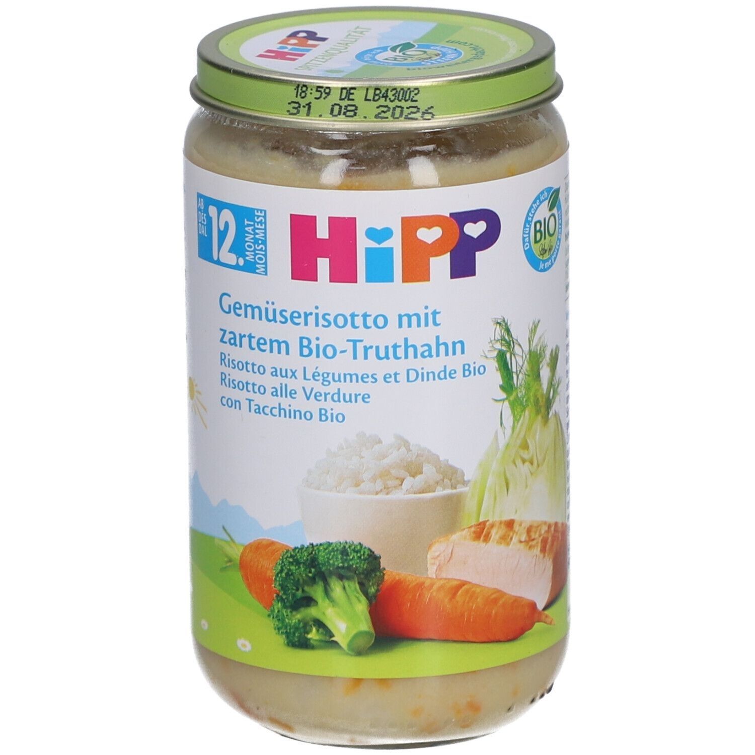 Pot pour bébé HiPP, risotto aux légumes et dinde bio. Ingrédients visibles: légumes, riz, viande. Label bio. Date de péremption.