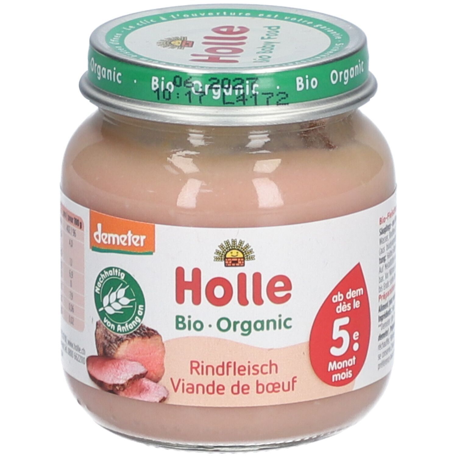 Glas mit Babynahrung. Aufschrift: Holle Bio-Organic Rindfleisch, ab dem 5. Monat. Demeter-Siegel. Grüner Deckel mit Aufschrift.