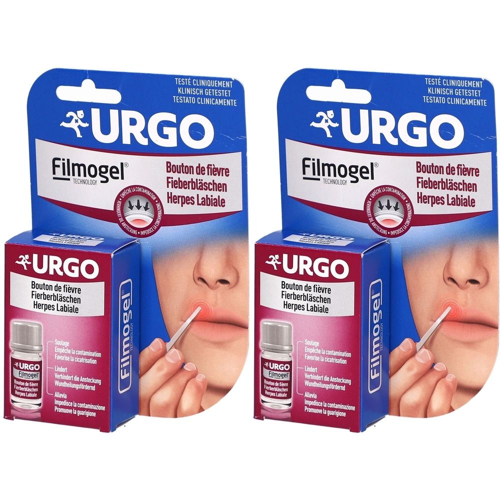 Zwei Packungen URGO Filmogel gegen Lippenherpes. Verpackung mit Produktabbildung und Produktnamen. Fläschchen mit Applikator.