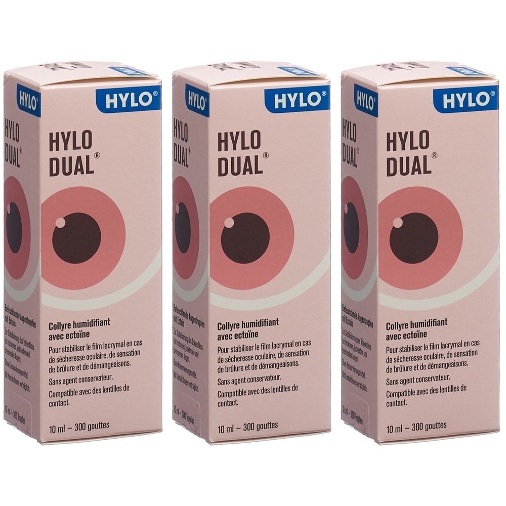 Trois boîtes de gouttes ophtalmiques HYLO DUAL. Emballage rose avec nom du produit et image d'un œil. Texte : "Collyre humidifiant avec ectoine".