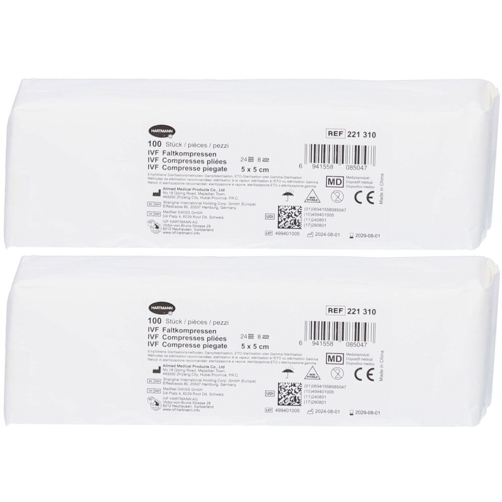 Zwei weiße Packungen mit IVF Faltkompressen. Aufdrucke: 100 Stück, 5x5 cm, REF 221 310, CE-Kennzeichnung.
