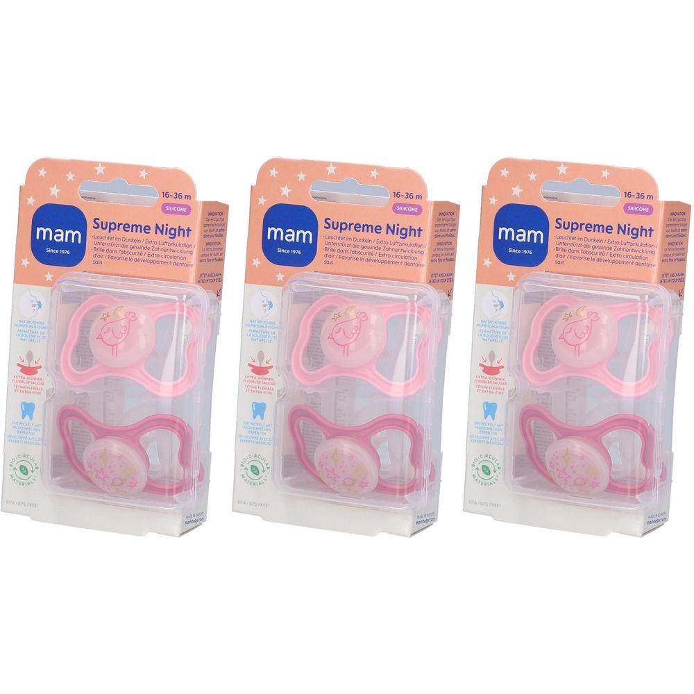 Drei Packungen MAM Supreme Night Schnuller. Rosa Silikon-Sauger, 16-36 Monate. Verpackung mit Produktnamen und Logo.